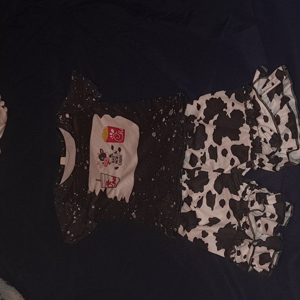 Cowprint bell bottoms with matching shirt